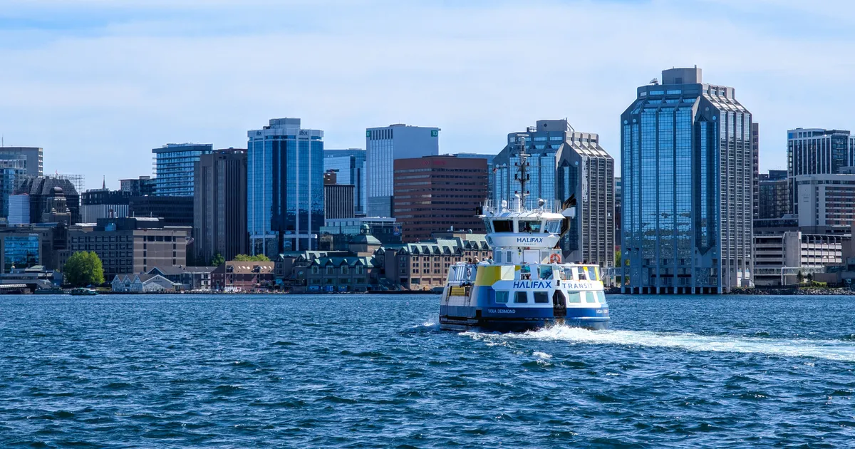 The Halifax waterfront and harbour with the Dartmouth shore beyond, the city where loans Halifax borrowers weigh a payday loan against an installment loan under Nova Scotia rules